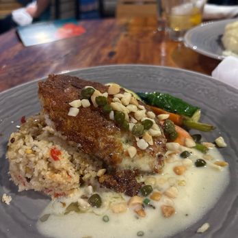 Duke's La Jolla - Sauteed Macnut and Herb Crusted Fresh Fish - New American Near Me - La Jolla, California Duke's La Jolla - Sauteed Macnut and Herb Crusted Fresh Fish - New American Near Me - La Jolla, California