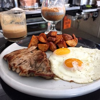 Pinch Kitchen - El secreto pork and eggs with awesomely seasoned country potatoes - New American Near Me - Miami, Florida
