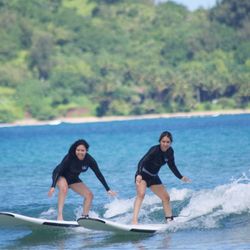 Aloha Surfing School - Up and riding a wave!