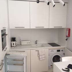Lisbon Serviced Apartments - Kitchen with Washing machine