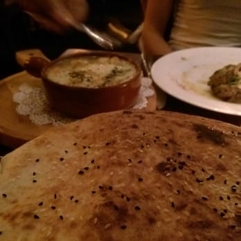 Bustan - The overly sweet Saganaki drowned in brandy and melted cheese. - Mediterranean Near Me - New York, New York Bustan - The overly sweet Saganaki drowned in brandy and melted cheese. - Mediterranean Near Me - New York, New York