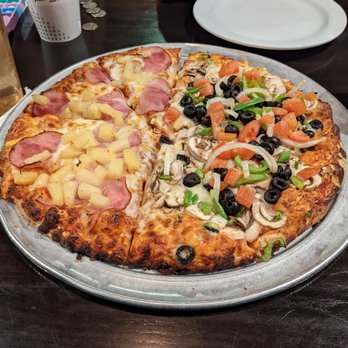 Round Table Pizza - Half guinevere's delight and half Canadian bacon and pineapple - Pizza Near Me - Tacoma, Washington Round Table Pizza - Half guinevere's delight and half Canadian bacon and pineapple - Pizza Near Me - Tacoma, Washington