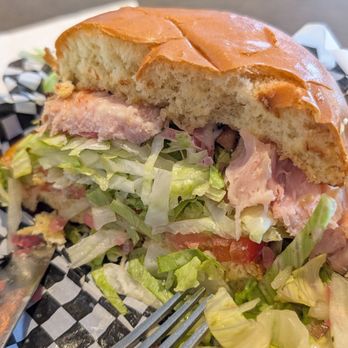 The Sleepy Whale - Uptown - Huge slices of turkey and fresh veggies on a brioche bun. Cannot go wrong! - American Near Me - Phoenix, Arizona