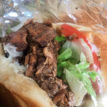Tata - a sandwich with meat and lettuce - Specialty Food Near Me - Toronto, Ontario Tata - a sandwich with meat and lettuce - Specialty Food Near Me - Toronto, Ontario