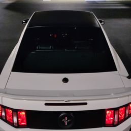 Roof and deck lid filler panel wrap with blacked out faux badge swap.