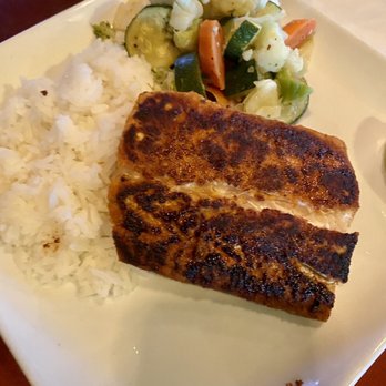 Mike's Grillhouse - Blackened Mahi Mahi w/piccata sauce (not pictured- it was on the side so you could pour it all over; super delicious)! - American Near Me - Modesto, California Mike's Grillhouse - Blackened Mahi Mahi w/piccata sauce (not pictured- it was on the side so you could pour it all over; super delicious)! - American Near Me - Modesto, California