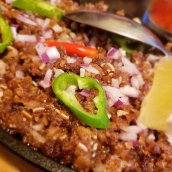 La Parilla De Manila - a close up of a plate of food - Filipino Near Me - Colonia, New Jersey La Parilla De Manila - a close up of a plate of food - Filipino Near Me - Colonia, New Jersey