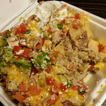 Amigos Mexican Restaurant - Chicken nachos, partially eaten. - Mexican Near Me - Bishop, California Amigos Mexican Restaurant - Chicken nachos, partially eaten. - Mexican Near Me - Bishop, California