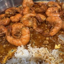 Spicy Grab a Crab house sauce shrimp with side of white rice Spicy Grab a Crab house sauce shrimp with side of white rice
