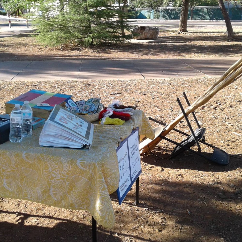 Bisbee Farmer's Market - a table with a variety of items on it - Farmers Market Near Me - Bisbee, Arizona