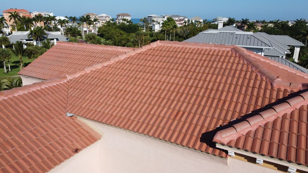 Slide of D’ Roofing Group