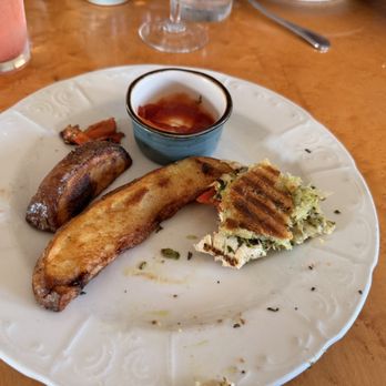 Trillium Cafe & Inn - Chicken panini with potato wedges (halfway eaten) - New American Near Me - Mendocino, California Trillium Cafe & Inn - Chicken panini with potato wedges (halfway eaten) - New American Near Me - Mendocino, California