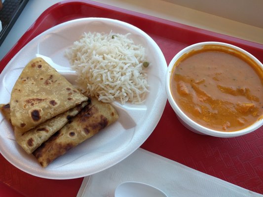Photo of Rajun Cajun - Chicago, IL, US. Butter chicken with paratha and basmati rice