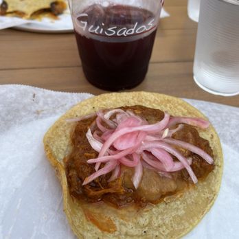 Guisados - Cochinita Pibil taco and my half drank Jamaica! - Tacos Near Me - Long Beach, California Guisados - Cochinita Pibil taco and my half drank Jamaica! - Tacos Near Me - Long Beach, California