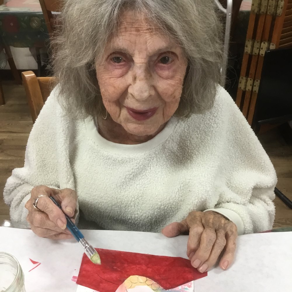 My mom working on an art project.  A lasting, beautiful gift she left me.