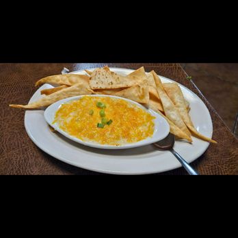 Philay's Catfish N' More - IG: tonylameats | CRAB AND SHRIMP QUESO Lump crab and grilled shrimp blended in melted cheeses. Served with fried pita chips. - Seafood Near Me - Gonzales, Louisiana