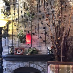 Little Italy Pizzeria - Fireplace in the restaurant. Very Italian decor. Very nice music.