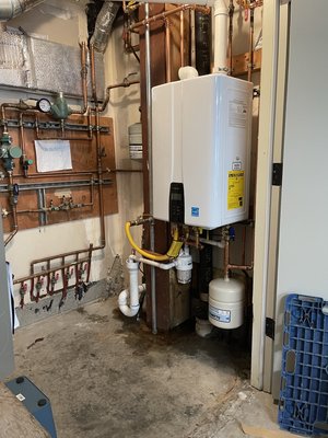 Tankless Water Heater Retrofits - These are all pictures of new tankless water heaters that were installed in place of a gas fired tanks. All of these clients are enjoying space savings, energy use reduction and of course, unlimited hot water. Tankless Water Heater Retrofits - These are all pictures of new tankless water heaters that were installed in place of a gas fired tanks. All of these clients are enjoying space savings, energy use reduction and of course, unlimited hot water.