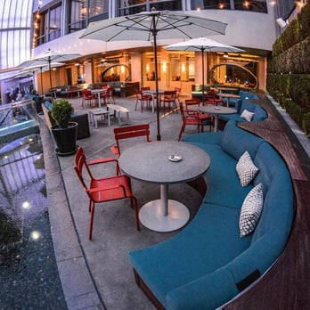 Living Room - an outdoor seating area with tables and chairs - Lounges Near Me - Atlanta, Georgia
