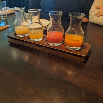 Grace & Grit - Juice options on the mimosa flight- comes with a bottle of champagne - Southern Near Me - Mount Pleasant, South Carolina