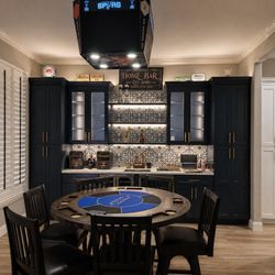 Legacy Bath & Kitchen - Former formal dining room was completely reimagined into a custom bar, lounge, and poker room.