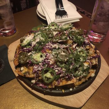 Ghost Donkey - Mole chicken nachos with lots of layers... also try the pumpkin hot sauce. - Mexican Near Me - Las Vegas, Nevada
