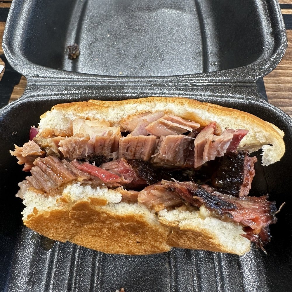 Sliced lean brisket sandwich! I was struggling between wanting to scarf it down and snapping a pic to post a review. Sliced lean brisket sandwich! I was struggling between wanting to scarf it down and snapping a pic to post a review.