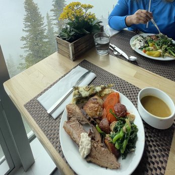 Northern Lights Alpine Kitchen - Buffet plates with Japanese rapini, gochujang carrots, pesto pizza, beef tenderloin, potatoes, alfredo pasta - Buffets Near Me - Banff, Alberta
