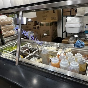 Pelicana Chicken - Food prep area at the counter. - Food Court Near Me - Atlanta, Georgia Pelicana Chicken - Food prep area at the counter. - Food Court Near Me - Atlanta, Georgia