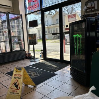 Femi's Pizza - a caution sign on the floor - Pizza Near Me - Collingdale, Pennsylvania