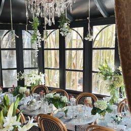 a dining room with a chandelier
