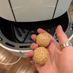 Sesame balls being reheated in my air fryer Sesame balls being reheated in my air fryer