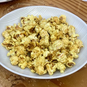 The Lark - Delicious curry seasoned popcorn, with a little sweetness, similar to kettle corn. - New American Near Me - Santa Barbara, California