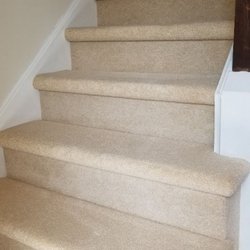 Carpet Crafters - A tufted carpet well tailored to a set of steps.