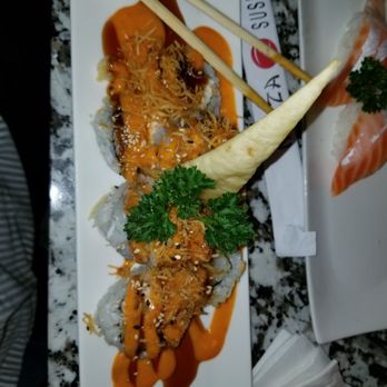 Ninza Sushi Bar - a plate of sushi and chopsticks - Japanese Near Me - Wichita, Kansas Ninza Sushi Bar - a plate of sushi and chopsticks - Japanese Near Me - Wichita, Kansas