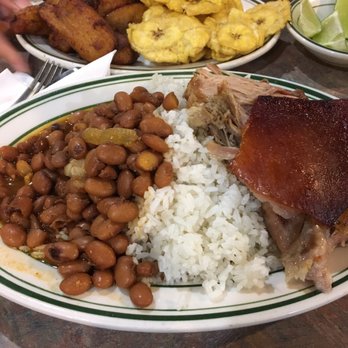 Brisas Del Caribe - Rice and beans with roast pork (pernil) and a side of tostones and manduros - Dominican Near Me - Bronx, New York Brisas Del Caribe - Rice and beans with roast pork (pernil) and a side of tostones and manduros - Dominican Near Me - Bronx, New York