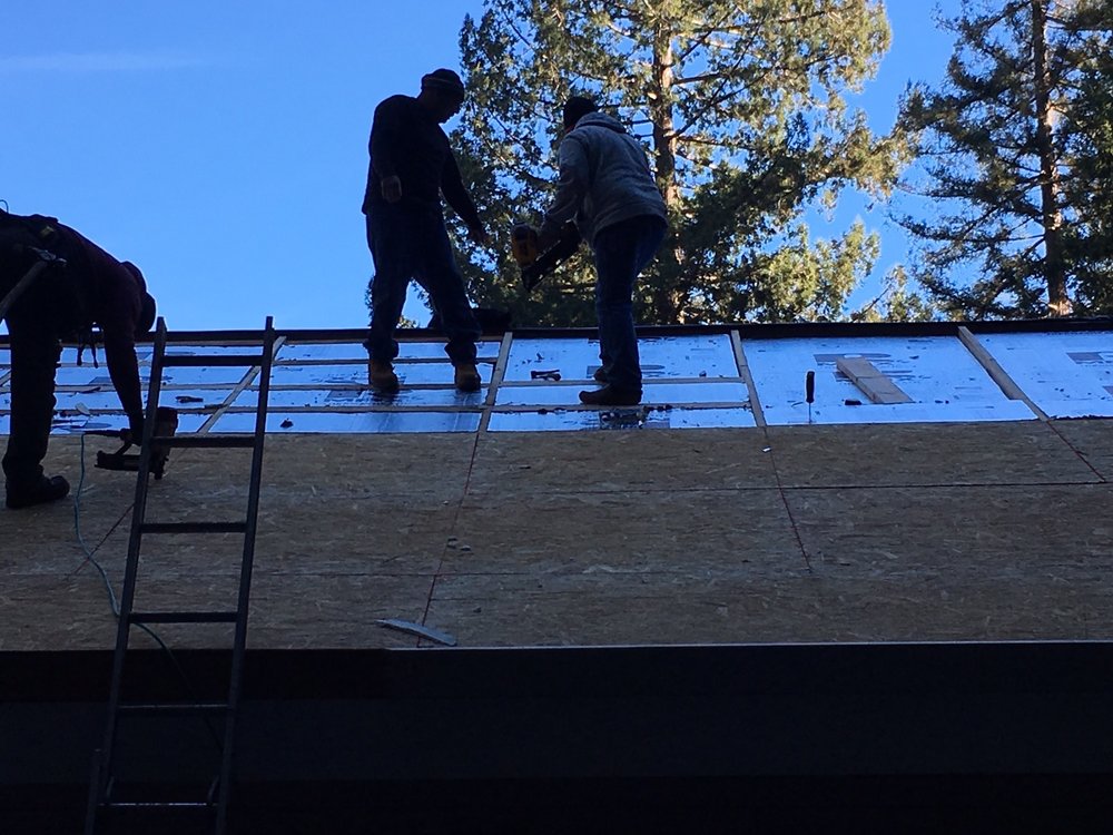 Slide of J E Johnson Roofing