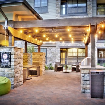 Enclave at Brookside - 1 of 2 grilling stations in the "Outdoor Oasis" at The Enclave at Brookside - Apartments Near Me - Tulsa, Oklahoma Enclave at Brookside - 1 of 2 grilling stations in the "Outdoor Oasis" at The Enclave at Brookside - Apartments Near Me - Tulsa, Oklahoma