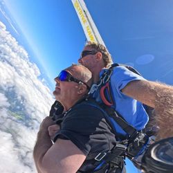 Me jumpin g out of a plane with the atmosphere behind me. And the plane above me, what a view