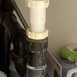 Rocky Creek Village Senior living - Under kitchen sink pipes have always looked like this