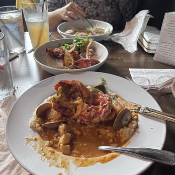 The Exchange - This is Jeannette eating her seafood over the risotto. It had clams, scallops shrimp I think muscles too. - Bars Near Me - Clifton Park, New York The Exchange - This is Jeannette eating her seafood over the risotto. It had clams, scallops shrimp I think muscles too. - Bars Near Me - Clifton Park, New York