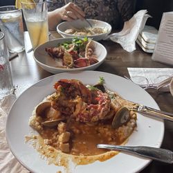 The Exchange - This is Jeannette eating her seafood over the risotto. It had clams, scallops shrimp I think muscles too.