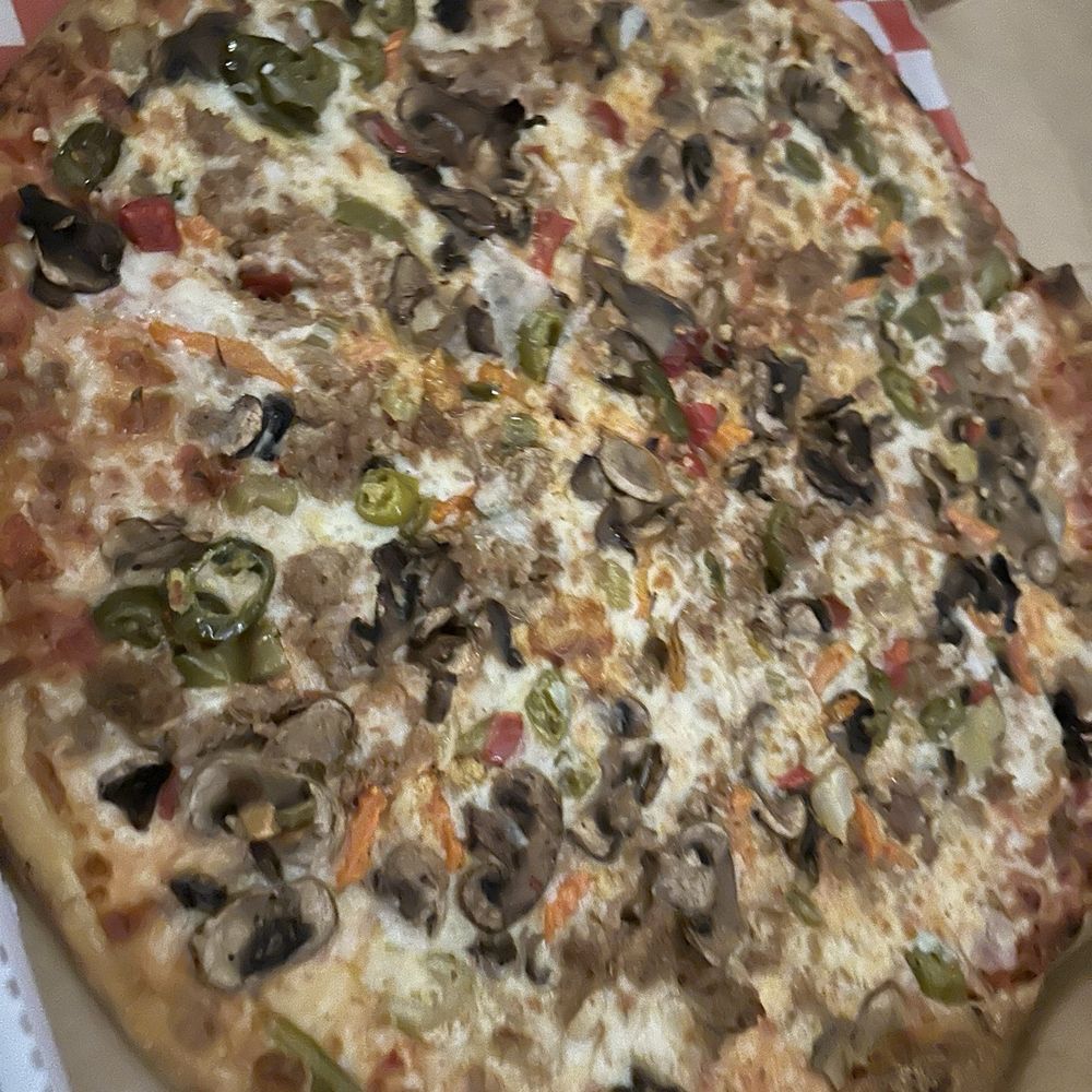 Pizza Matta - New York style sausage, mushrooms, giardineira - Pizza Near Me - Chicago, Illinois Pizza Matta - New York style sausage, mushrooms, giardineira - Pizza Near Me - Chicago, Illinois
