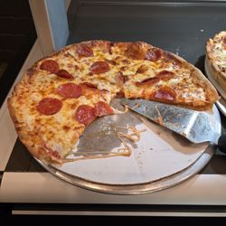 Rafaels Italian Restaurant - Hot gooey melty cheese and pepperoni