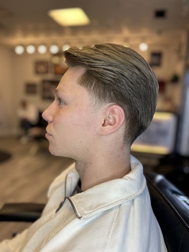 Millrise Barber Shop  Logo