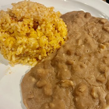 Finn McCool's Bar & Grill - Rice and beans that come with the 3 Tacos - American Near Me - Englewood, Colorado Finn McCool's Bar & Grill - Rice and beans that come with the 3 Tacos - American Near Me - Englewood, Colorado