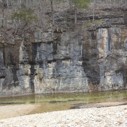 Clifty Creek Natural Bridge - Cliff along creek and trail