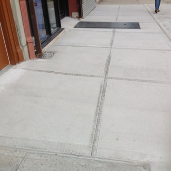 Leo's Construction - a man walking down a sidewalk - General Contractors Near Me - Brooklyn, New York Leo's Construction - a man walking down a sidewalk - General Contractors Near Me - Brooklyn, New York
