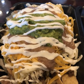 Tom's Tailgate - Nachos. You get to to choose three scoops of meat. But the don't melt there cheese here I asked - Mexican Near Me - La Mirada, California