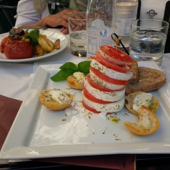 Panella - Best Caprese with Buffalo Mozzarella and behind it rice filled tomatoes! - Bakeries Near Me - Rome, RM Panella - Best Caprese with Buffalo Mozzarella and behind it rice filled tomatoes! - Bakeries Near Me - Rome, RM